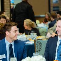 Two guests having a conversation at Scholarship Dinner 2019